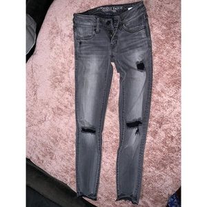 Grey ripped skinny jeans